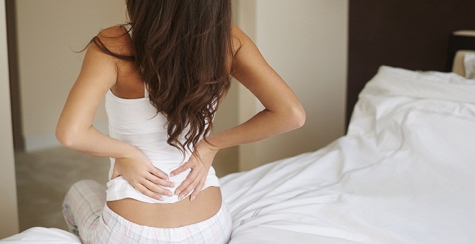 10 причин боли в пояснице у женщин, какая связь с болезнями?